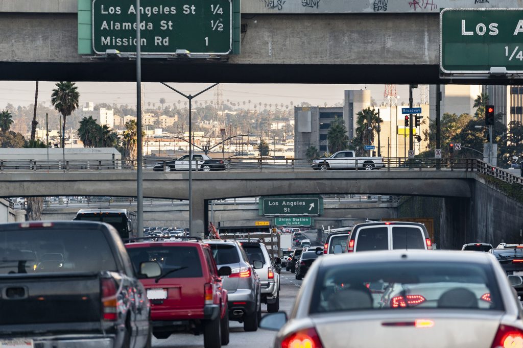 Police Car Cross Over 101 Near Los Angeles St. and Alameda in Heavy LA Traffic